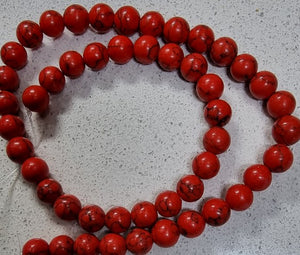 12MM SYNTHETIC TURQUOISE BEADS - RED