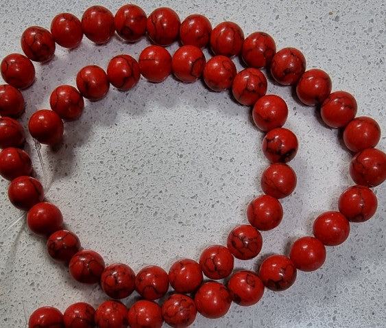 12MM SYNTHETIC TURQUOISE BEADS - RED