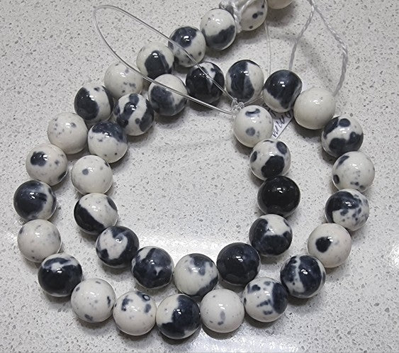 10MM SYNTHETIC OCEAN WHITE JADE - BLACK/WHITE MOTTLE