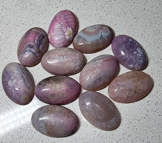 CABOCHONS 30 X 20 X 7MM OVAL NATURAL FIRE AGATE