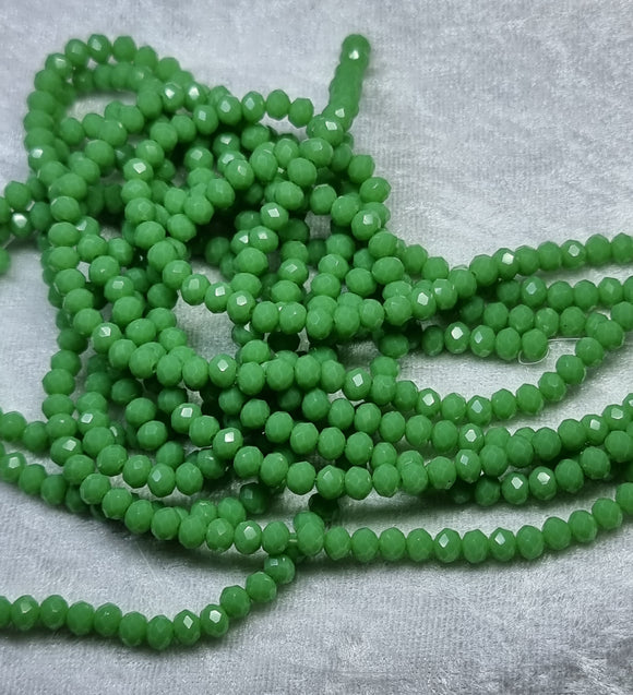 4MM GLASS FACETED RONDELLE BEADS - MID GREEN COLOUR