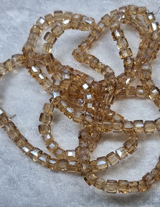 CUBES - 4MM GLASS - FACETED PALE ORANGE
