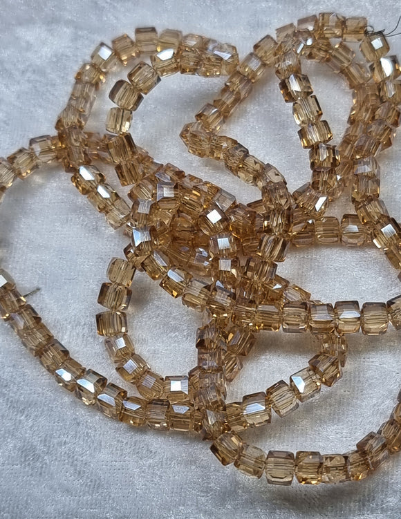 CUBES - 4MM GLASS - FACETED PALE ORANGE