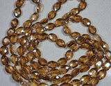 OVALS - 16 x 12 x 7MM FACETED CRYSTAL GLASS - LIGHT GOLDENROD