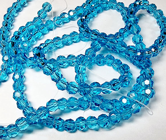 4MM GLASS ROUND FACETED BEADS - AQUAMARINE BLUE