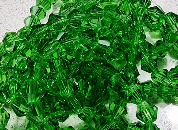 BICONES - 6MM GLASS FACETED BICONES - MED. GREEN