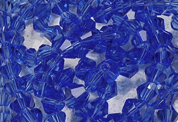 BICONES - 6MM GLASS FACETED BICONES - MED. BLUE