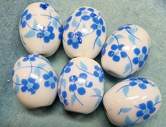 12X10X10MM H/MADE PORCELAIN BEADS - OVAL - MID BLUE