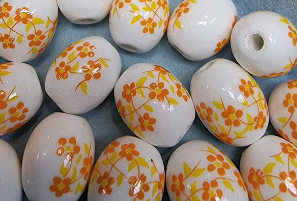 12X10X10MM H/MADE PORCELAIN BEADS - OVAL - ORANGE
