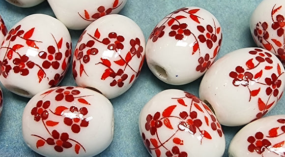 12X10X10MM H/MADE PORCELAIN BEADS - OVAL - DARK RED