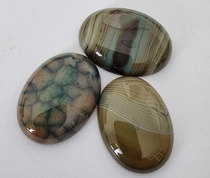 CABOCHONS 32x22x7MM OVAL NATURAL STRIPED AGATE