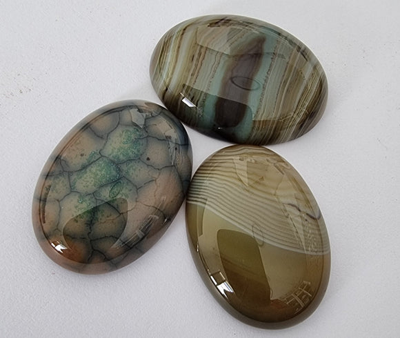 CABOCHONS 32x22x7MM OVAL NATURAL STRIPED AGATE