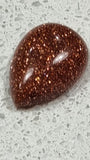 14X9X5MM TEARDROP CABOCHON - SYNTHETIC GOLDSTONE