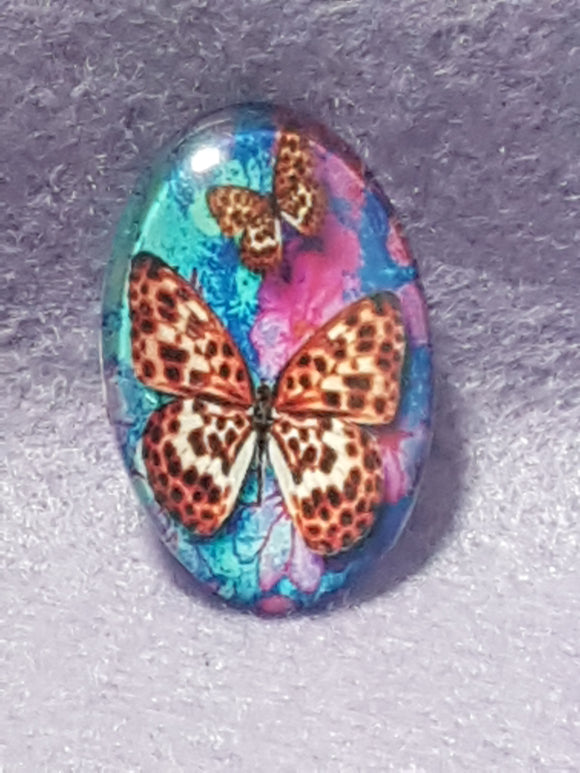 CABOCHON - 30 X 20MM GLASS OVAL - BUTTERFLY - BLUE/PURPLE