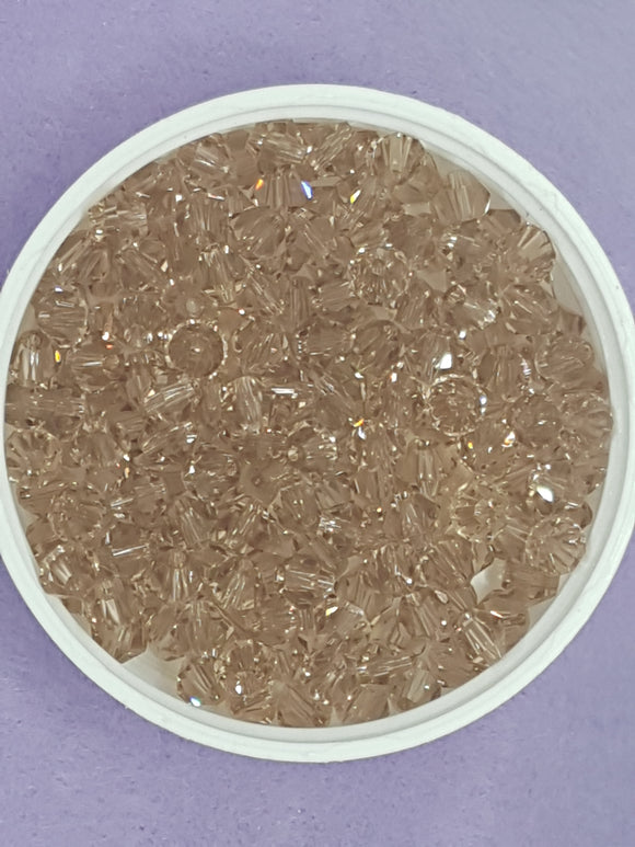 BICONES - 6MM CRYSTAL GLASS FACETED BEADS - GRADE AA - SANDY BROWN
