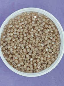BICONES - 3MM GLASS FACETED ELECTROPLATED BEADS - BISQUE