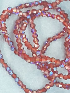 BICONES - 2MM GLASS FACETED ELECTROPLATED BEADS - Per Packet - FIREBRICK