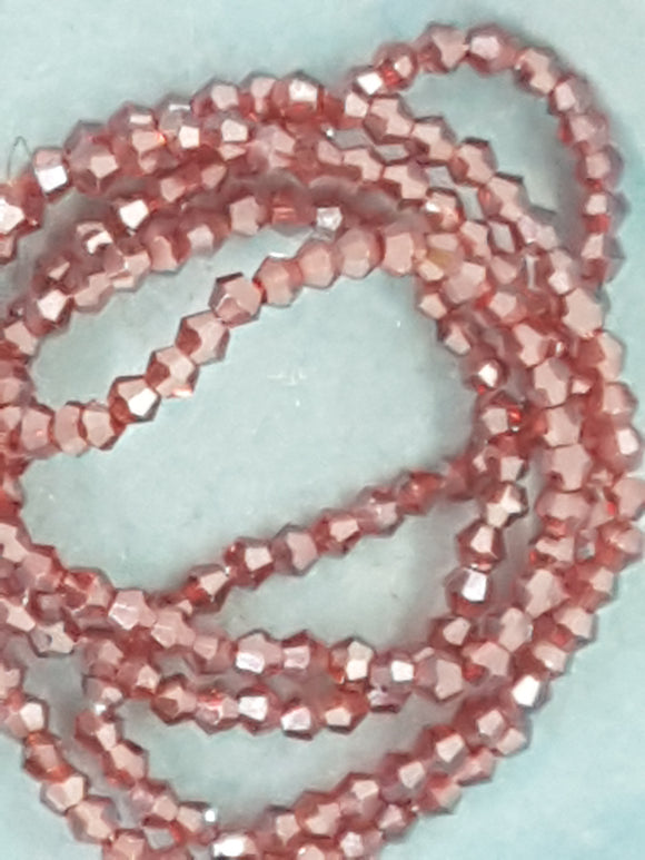 BICONES - 2MM GLASS FACETED ELECTROPLATED BEADS - Per Packet - RED/BROWN