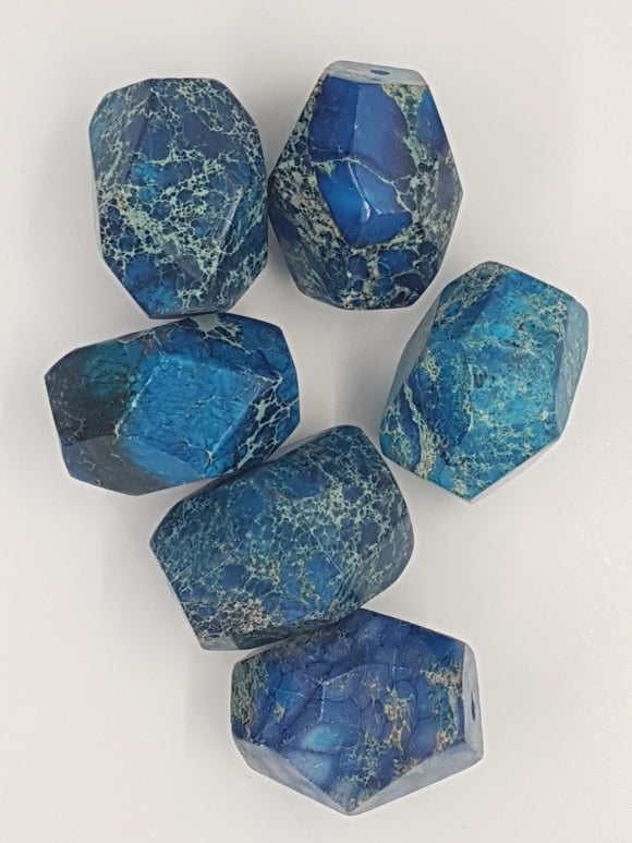 25-30MM NATURAL FACETED REGALITE BEADS- BLUE/NATURAL COLOUR