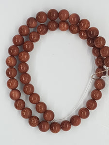8MM SYNTHETIC GOLDSTONE BEADS