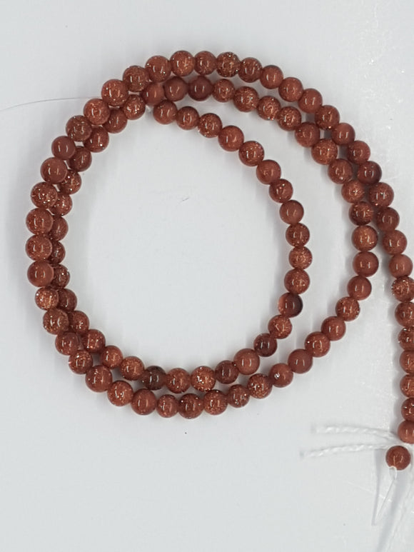 4MM SYNTHETIC GOLD STONE BEADS
