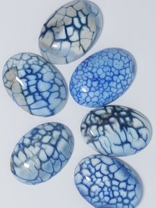 CABOCHONS 25 X 18MM OVAL NATURAL FIRE AGATE