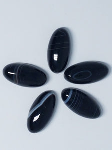 CABOCHONS 20X10X7MM HORSE EYE NATURAL BLACK AGATE