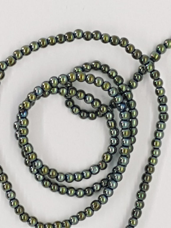 2.5MM GLASS NON MAGNETIC SYNTHETIC HEMATITE BEADS - GREEN