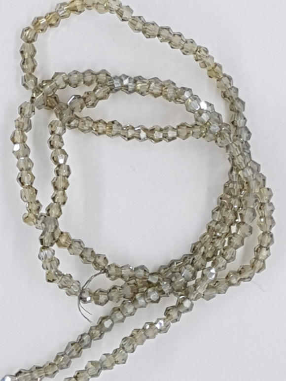 BICONES - 2MM CRYSTAL GLASS FACETED BEADS - Per Strand - LIGHT GOLDEN ROD