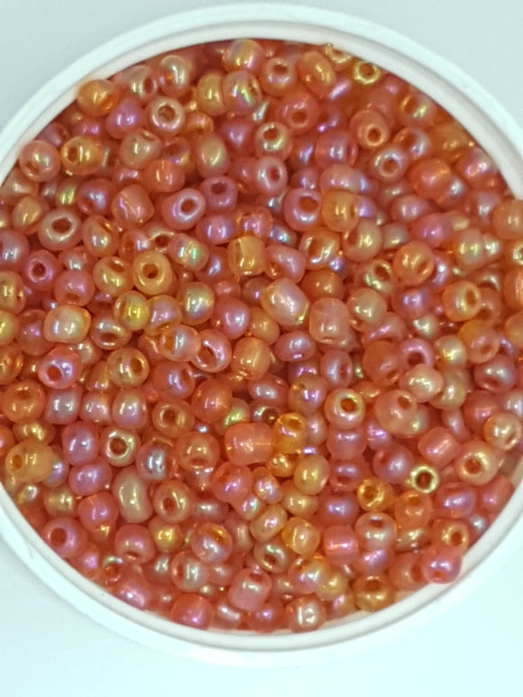6/0 CHINESE ROUND SEED BEADS - TRANS. RAINBOW - ORANGE/RED