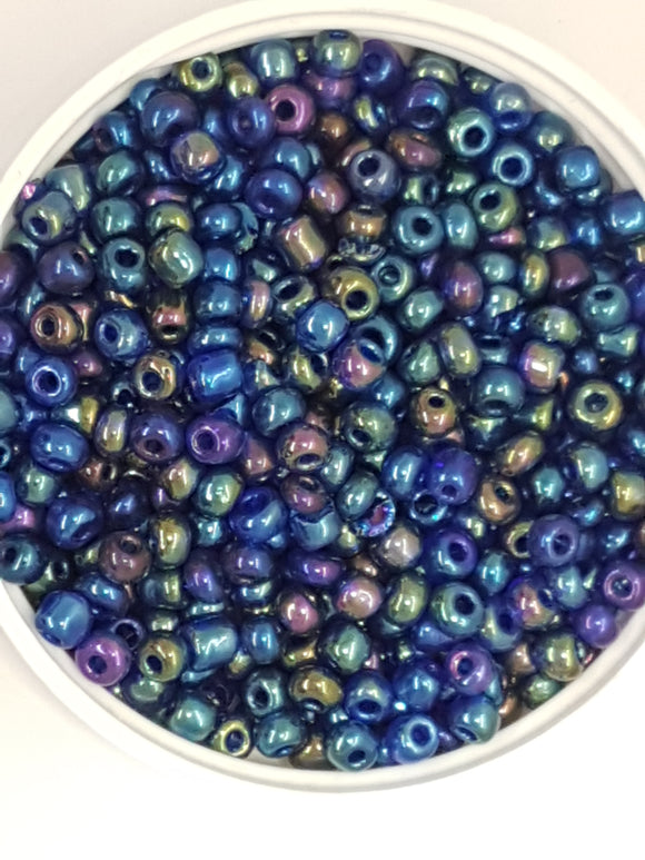 6/0 CHINESE ROUND SEED BEADS - TRANS. RAINBOW - BLUE