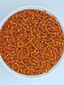 8/0 CHINESE GLASS SEED BEADS - TRANSPARENT ORANGE
