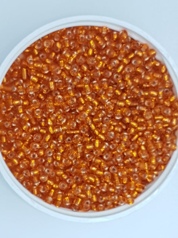 8/0 CHINESE GLASS SEED BEADS - TRANSPARENT ORANGE