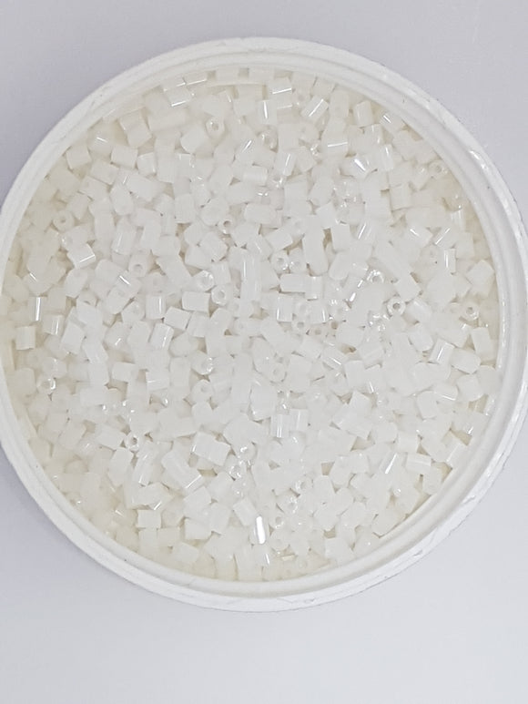 8/0 CHINESE GLASS TWO CUT HEXAGON SEED BEADS - TRANS. WHITE