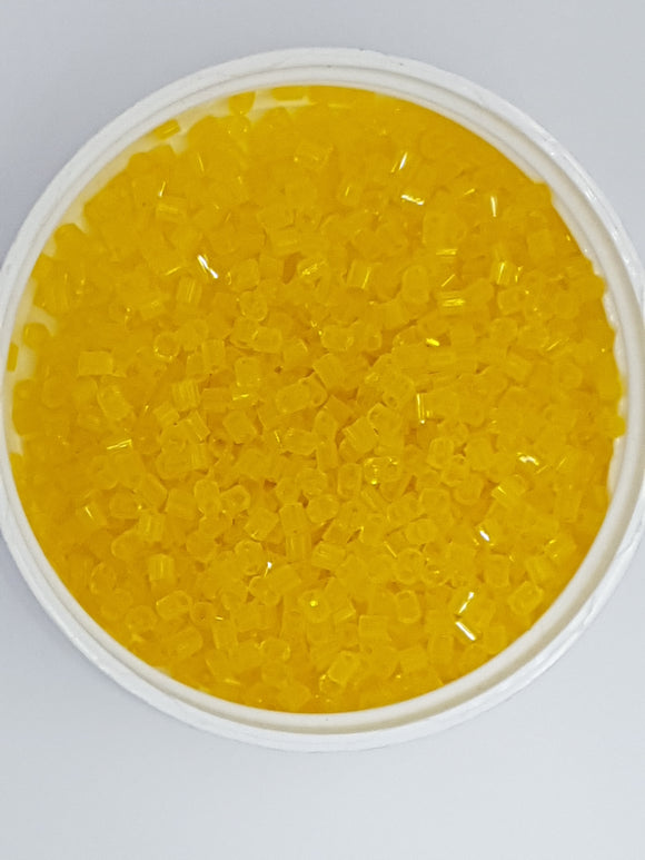 8/0 CHINESE GLASS TWO CUT HEXAGON SEED BEADS - TRANS. YELLOW