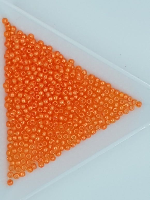 11/0 JAPANESE GLASS SEED BEADS - TRANS. COLOUR LINED - ORANGE