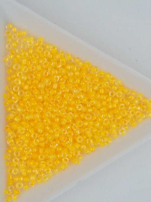 11/0 JAPANESE GLASS SEED BEADS - TRANS. COLOUR LINED - TANGERINE