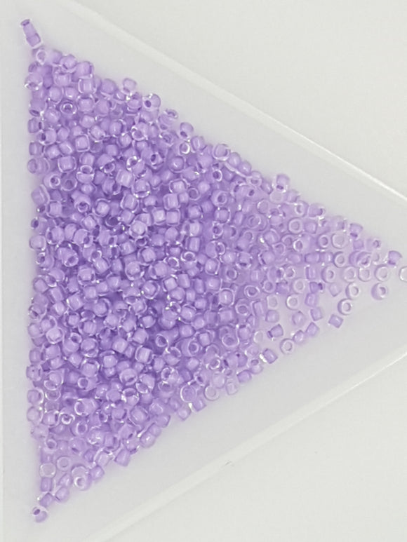 11/0 JAPANESE GLASS SEED BEADS - TRANS. COL. LINED - PURPLE