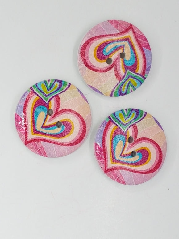 BUTTONS - 25MM WOODEN HEART MOTIF - CRIMSON/PURPLE