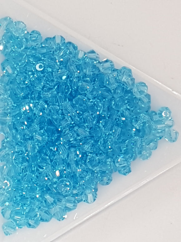 BICONES - 4x3.5MM CRYSTAL GLASS FACETED BICONES - DEEP SKY BLUE