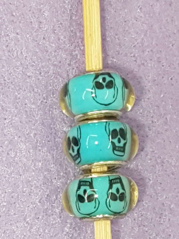 14MM LARGE HOLE ACRYLIC RONDELLES - BLUE/BLACK SKULLS