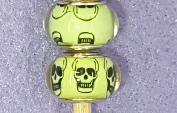 14MM LARGE HOLE ACRYLIC RONDELLES - YELLOW WITH SKULLS