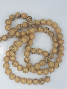 10MM  GLASS BEADS - CAMEL/BLACK SPLASH