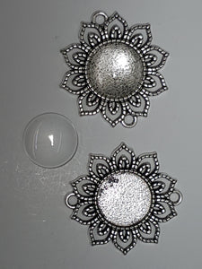 CABOCHON - 39 x 35MM DOMED GLASS TRANS. ROUND ANT. SILVER SETTING