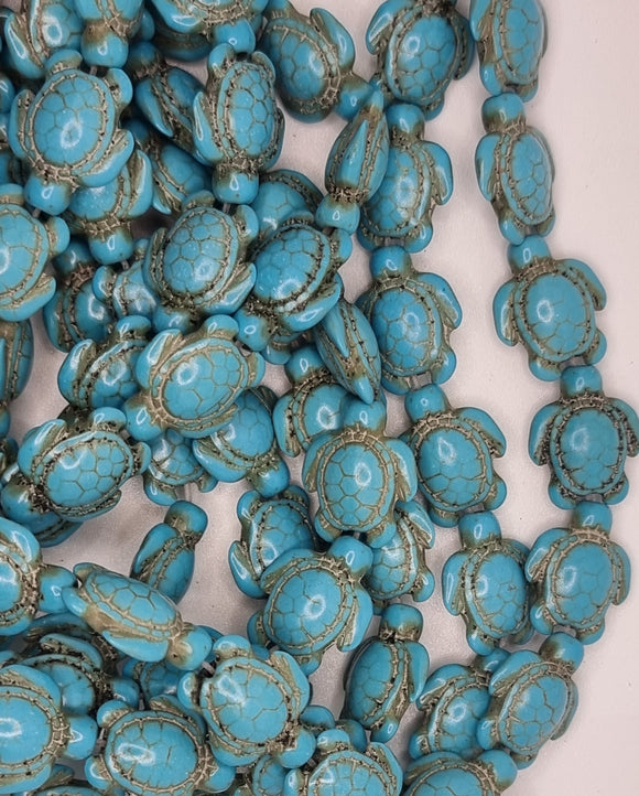CHARMS - TURTLES - 18 X 14.5 X 7.5MM SYNTH. TURQUOISE - PER STRAND