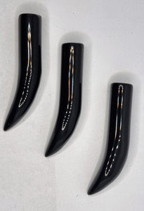 34-38 X 6.5-7MM UNDRILLED - IVORY SHAPE - NATURAL BLACK ONYX