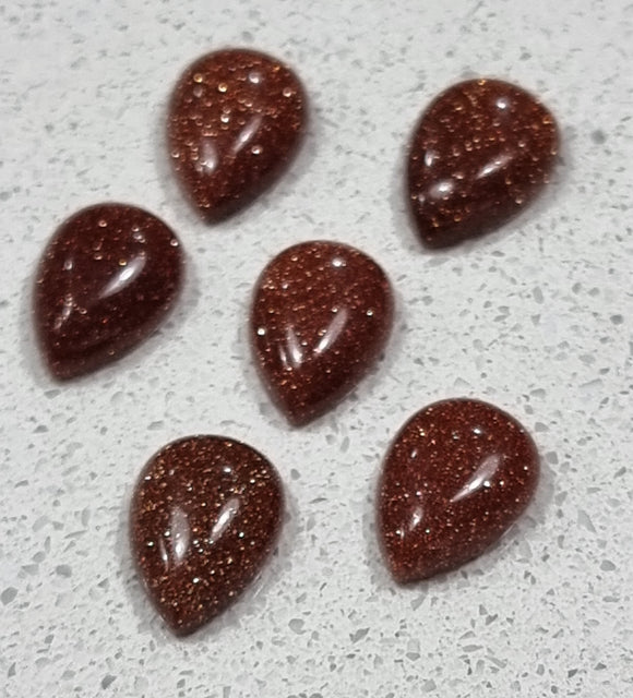 14X9X5MM TEARDROP CABOCHON - SYNTHETIC GOLDSTONE