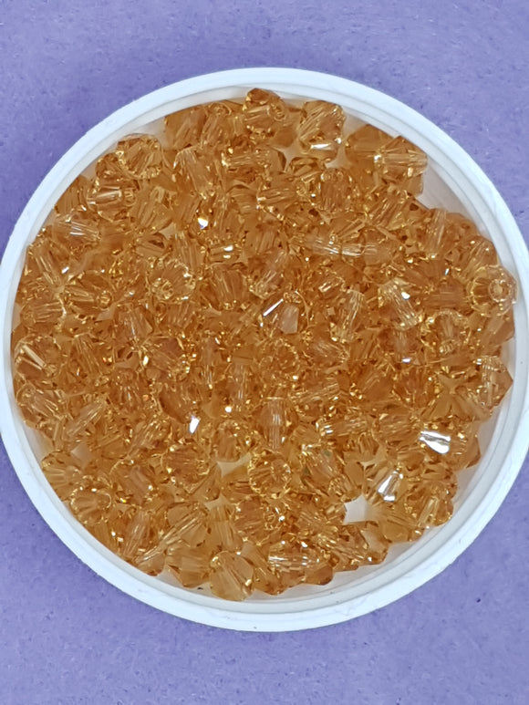BICONES - 6MM GLASS FACETED BEADS - COLOUR - GOLDEN ROD