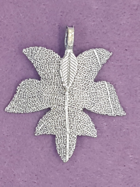 CHARMS - LEAVES - 40 X 35 PLATED - PALE BLUE COLOUR
