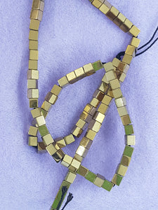CUBES - 4MM NON MAGNETIC SYNTHETIC HEMATITE - GOLD